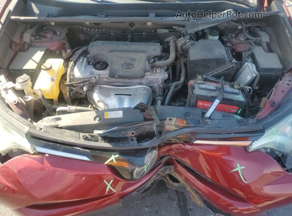 2T3WFREV9JW467559 2018 TOYOTA RAV4 Burgundy Vista interior trasera