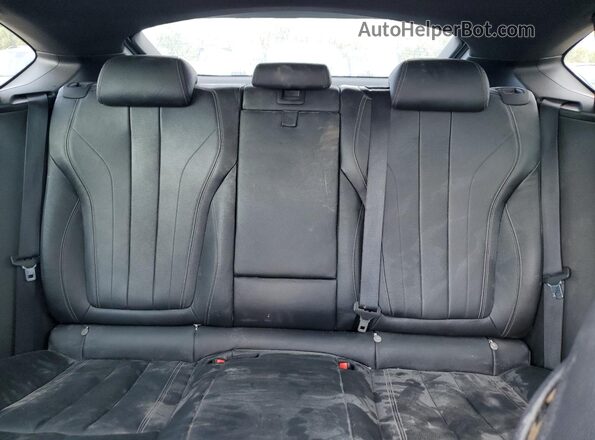 5UXKU0C53K0H99586 2019 BMW X6 Silver Widok wnętrza z tyłu