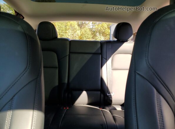 7SAYGDEE5RA217617 2024 TESLA MODEL Y Red Вид задньої частини салону