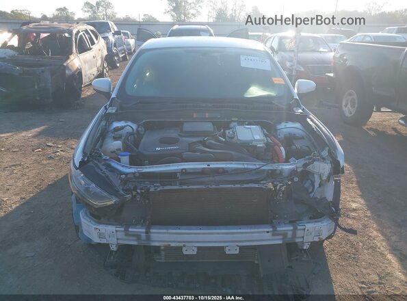 3FA6P0LU1JR195229 2018 FORD FUSION HYBRID White Rear interior view