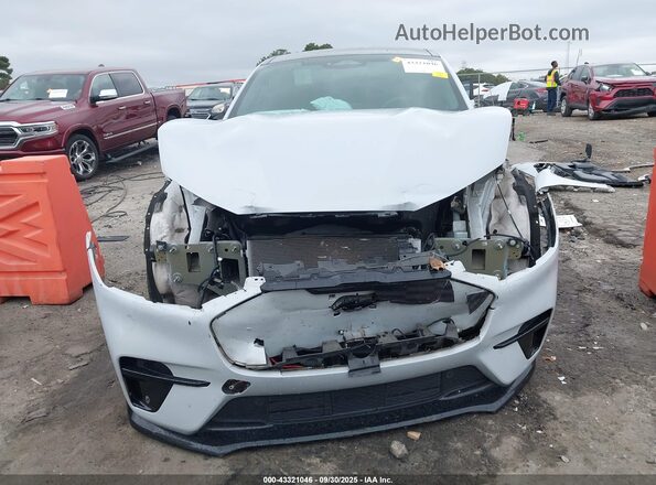 3FMTK4SE2MME03046 2021 FORD MUSTANG MACH-E White Vista interior trasera