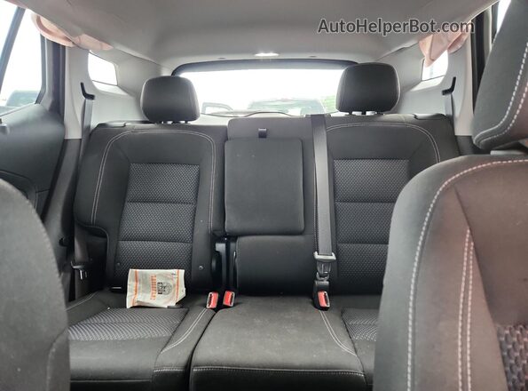 3GKALMEG7RL216859 2024 GMC TERRAIN Maroon Vista de los asientos traseros