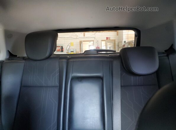 3GNCJPSB8LL153239 2020 CHEVROLET TRAX Red Rear seats view
