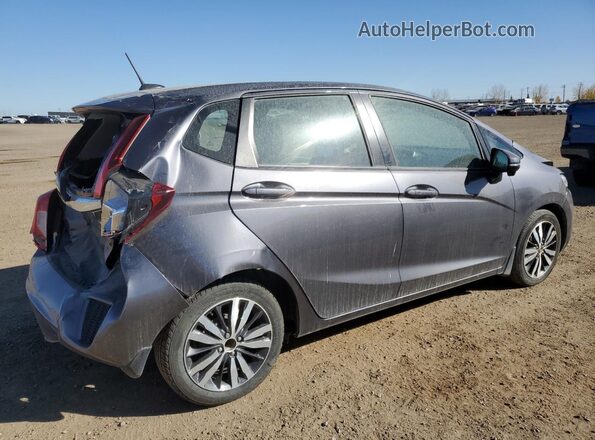3HGGK5H82HM103057 2017 HONDA FIT Gray Trasero derecho
