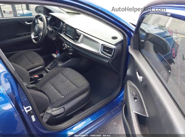 3KPA24AD8LE256339 2020 KIA RIO Blue Front interior view