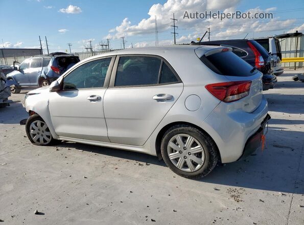 3KPA25AD2ME377522 2021 KIA RIO Silver Trasero izquierdo