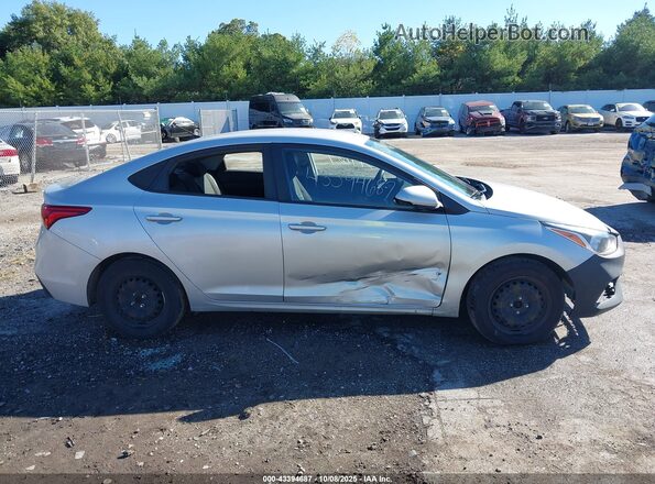 3KPC24A3XKE073264 2019 HYUNDAI ACCENT Серебряный Вид задней части салона