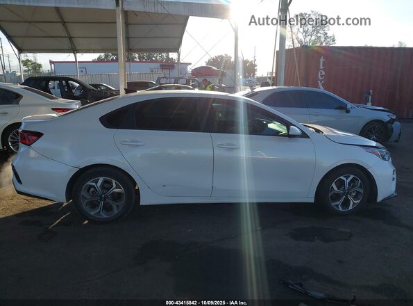 3KPF24AD0ME411280 2021 KIA FORTE White Rear interior view