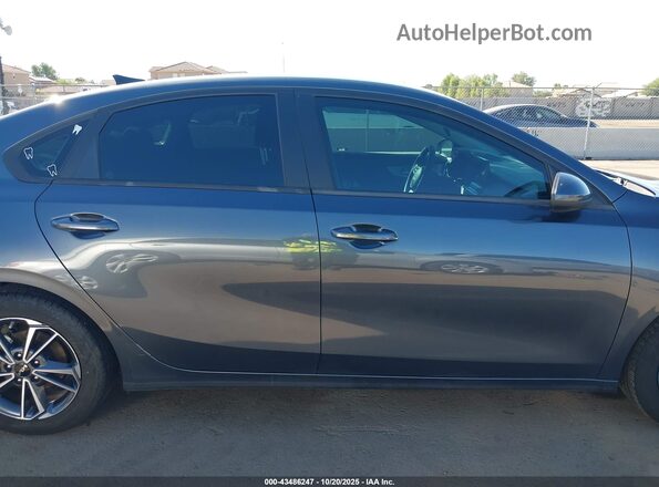 3KPF24AD1NE485275 2022 KIA FORTE Серый Вид задней части салона