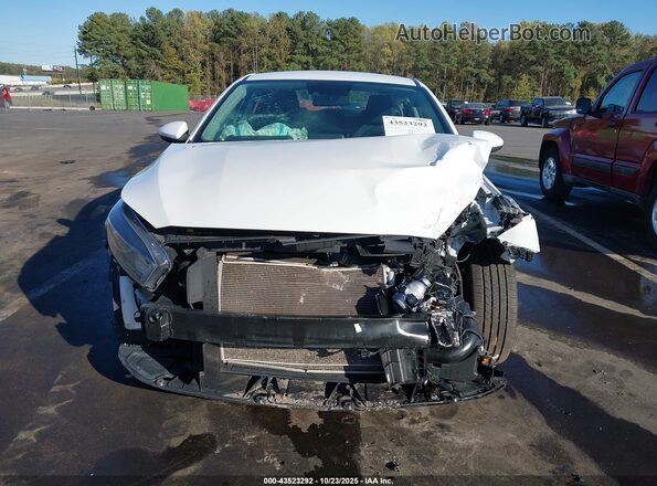3KPF24AD2NE465682 2022 KIA FORTE White Вид задньої частини салону