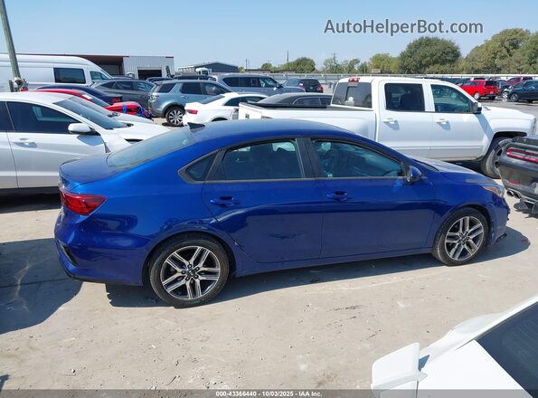 3KPF34ADXKE046892 2019 KIA FORTE Blue Vista interior trasera