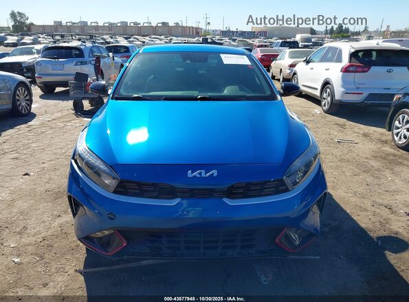 3KPF54ADXNE486223 2022 KIA FORTE Blue Vista interior trasera