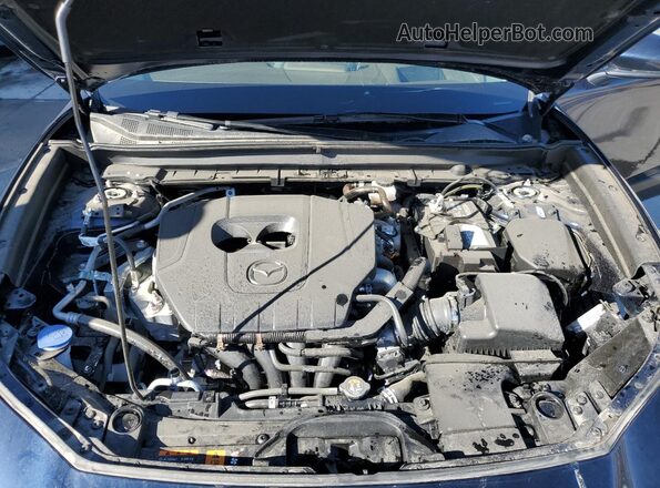 3MVDMBDM5SM801259 2025 MAZDA CX-30 Blue Rear interior view