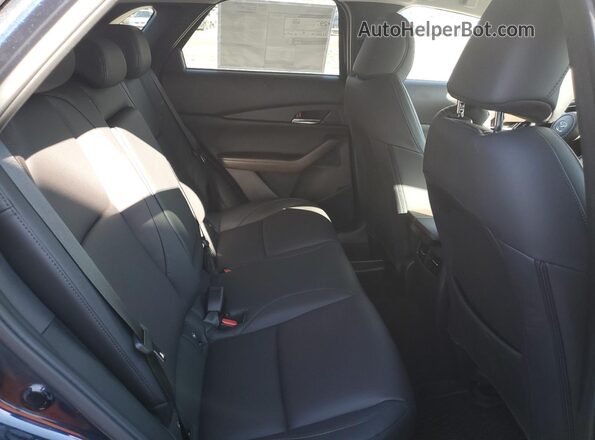 3MVDMBDM5SM801259 2025 MAZDA CX-30 Blue Rear seats view
