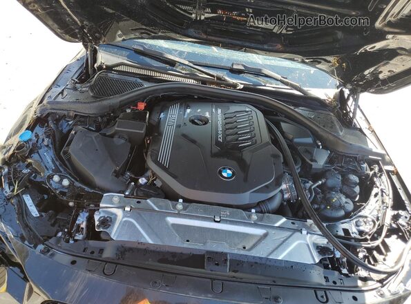 3MW53CM05S8F52124 2025 BMW M2 Черный Вид задней части салона