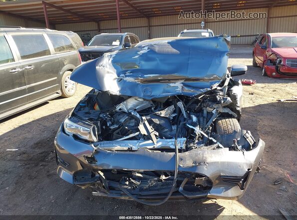 3MW5R1J02L8B07235 2020 BMW 3 SERIES Black Widok deski rozdzielczej
