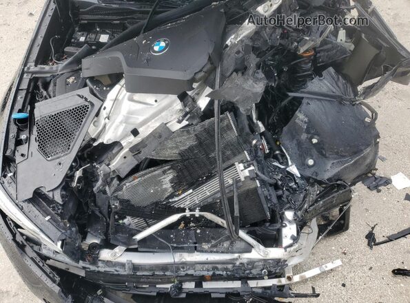 3MW5R1J03L8B08166 2020 BMW 3 SERIES Black Widok wnętrza z tyłu