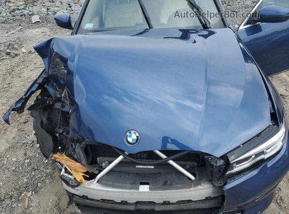 3MW5R7J07N8C58710 2022 BMW 3 SERIES Blue Rear interior view
