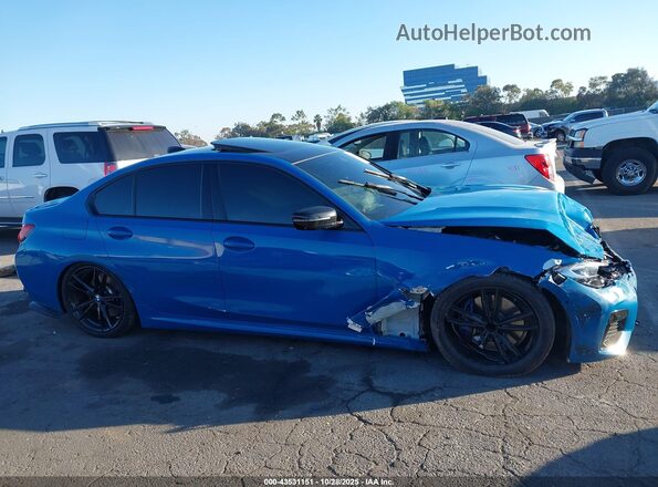 3MW5U7J08L8B43173 2020 BMW 3 SERIES Blue Սալոնի հետևի տեսք