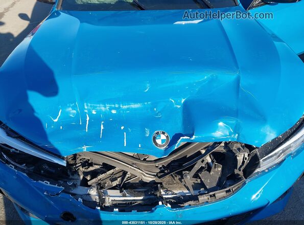 3MW5U7J08L8B43173 2020 BMW 3 SERIES Blue Հետևի տեսք