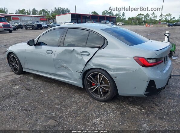 3MW69FF00P8D29806 2023 BMW 3 SERIES Silver Trasero izquierdo