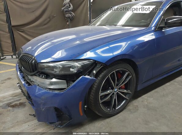 3MW69FF09P8D59323 2023 BMW 3 SERIES Blue წინა ხედი