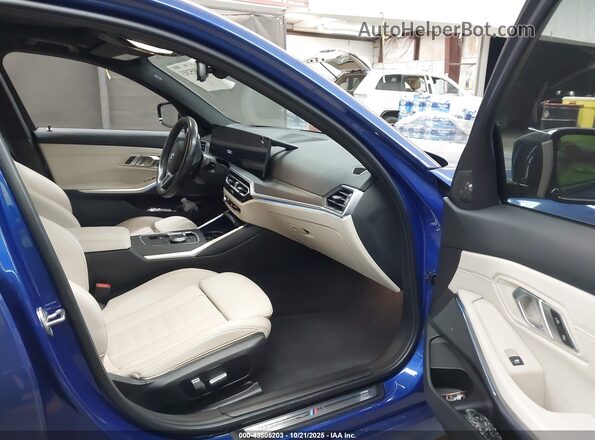 3MW69FF09P8D59323 2023 BMW 3 SERIES Blue წინა სალონის ხედი