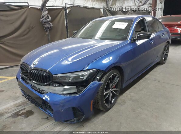 3MW69FF09P8D59323 2023 BMW 3 SERIES Blue წინა მარცხენა ხედი სამი მეოთხედიდან