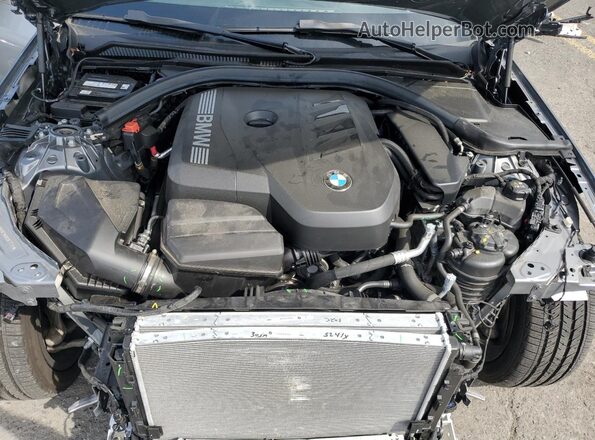 3MW89CW00S8F17712 2025 BMW 3 SERIES Gray Rear interior view