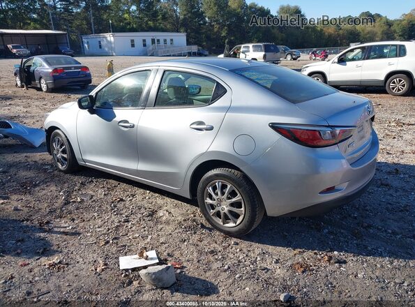 3MYDLBYV1KY528256 2019 TOYOTA YARIS Silver Trasero izquierdo