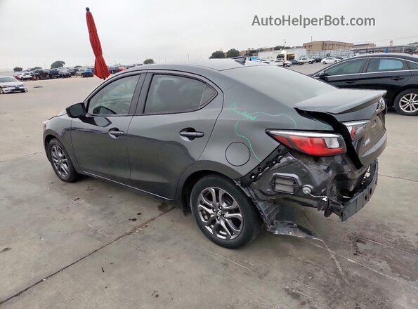 3MYDLBYV1LY709567 2020 TOYOTA YARIS Gray Trasero izquierdo