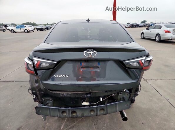3MYDLBYV1LY709567 2020 TOYOTA YARIS Gray Vista trasera