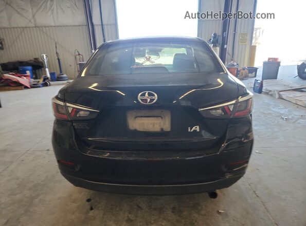 3MYDLBZV2GY113341 2016 TOYOTA SCION Black Rear view