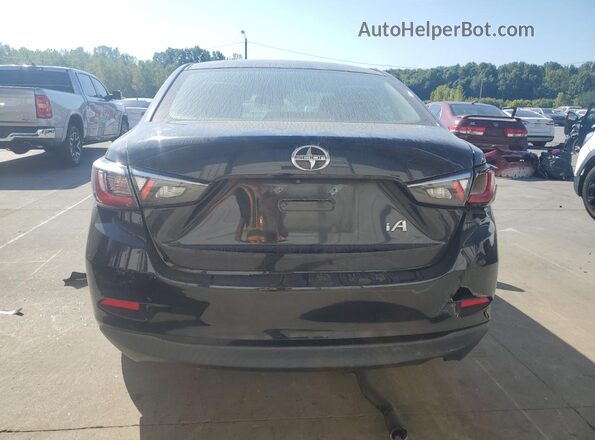 3MYDLBZVXGY129206 2016 TOYOTA SCION Black უკანა ხედი