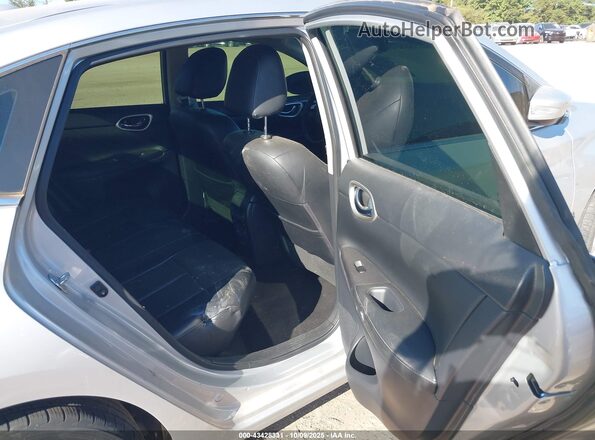 3N1AB7AP2JY256718 2018 NISSAN SENTRA Silver Вид наклейки з VIN-кодом