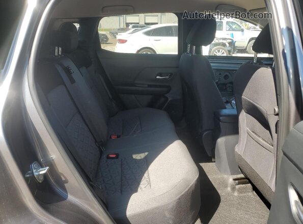 3N8AP6CB8SL404755 2025 NISSAN KICKS Gray Widok wnętrza z tyłu