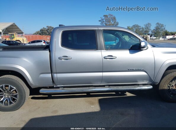 3TMBZ5DN6LM027450 2020 TOYOTA TACOMA Silver Widok wnętrza z tyłu