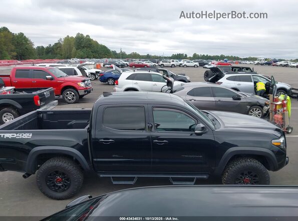 3TMCZ5AN6MM372987 2021 TOYOTA TACOMA Black Vista interior trasera