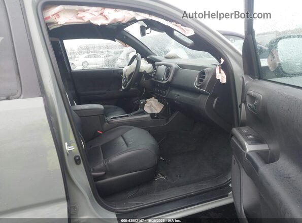 3TMCZ5AN7PM620989 2023 TOYOTA TACOMA Gray Front interior view