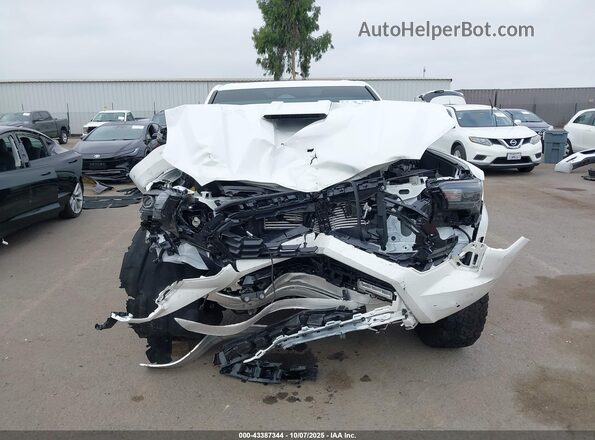 3TMLB5JN0RM057503 2024 TOYOTA TACOMA Белый Вид задней части салона
