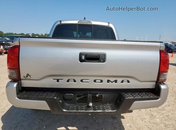 3TYAX5GN6NT039554 2022 TOYOTA LE Silver Rear view