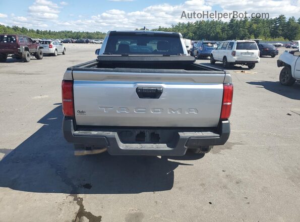 3TYJDAHN2RT010199 2024 TOYOTA TACOMA Silver Հետևի տեսք