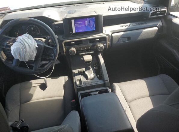 3TYJDAHN2RT010199 2024 TOYOTA TACOMA Silver Առջևի վահանակի տեսք