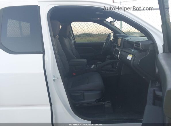 3TYJDAKN7ST020337 2025 TOYOTA TACOMA White Вид салону спереду