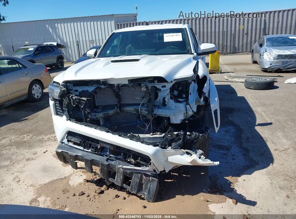 3TYLC5LN5ST028857 2025 TOYOTA TACOMA HYBRID White Vista interior trasera