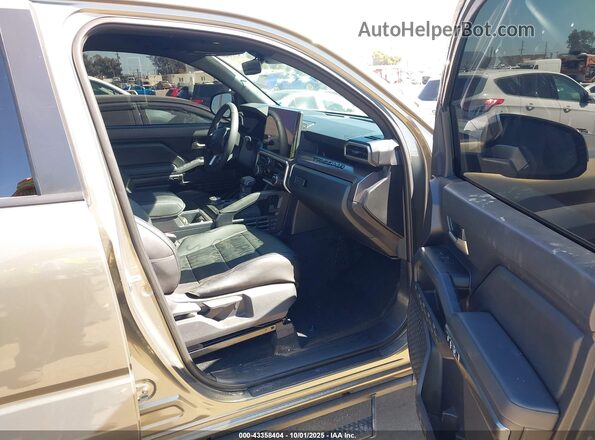 3TYLC5LN8ST024009 2025 TOYOTA TACOMA HYBRID Gold Front interior view