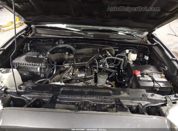 3TYRX5GN2NT038677 2022 TOYOTA TACOMA Gray Vista trasera