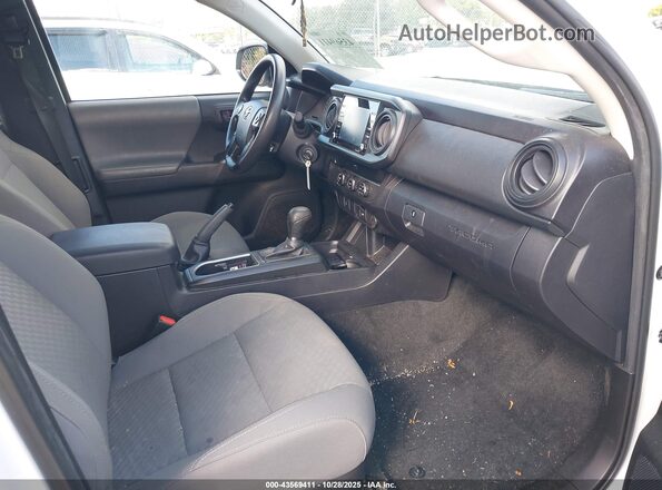 3TYRX5GN3PT075806 2023 TOYOTA TACOMA White წინა სალონის ხედი