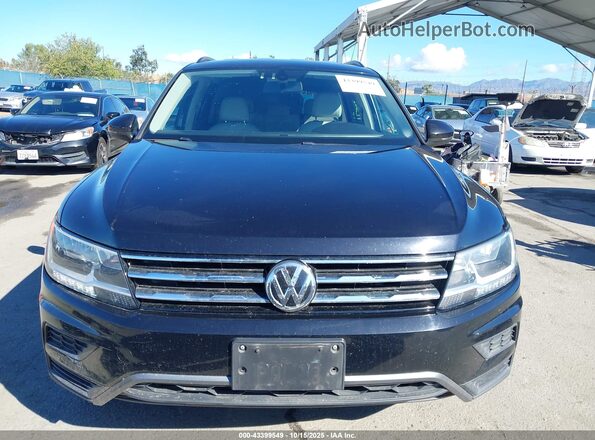 3VV2B7AX8LM027974 2020 VOLKSWAGEN TIGUAN Black Սալոնի հետևի տեսք