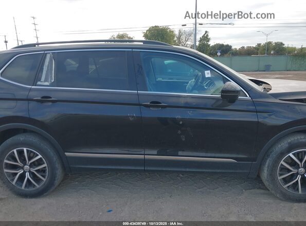 3VV3B7AX2MM073502 2021 VOLKSWAGEN TIGUAN Black Սալոնի հետևի տեսք